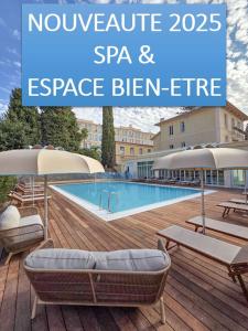 a swimming pool with chairs and umbrellas next to at Hôtel Miléade L'Orangeraie - Menton in Menton
