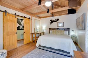 a bedroom with a bed and a wooden ceiling at 7 Mi to Bilgers Rocks Secluded 7-Acre Retreat in Clearfield