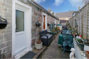 Posezení v ubytování 2 Bed Cottage Sleeps 4-Pets Welcome-Private Garden