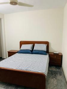 Ένα ή περισσότερα κρεβάτια σε δωμάτιο στο Khan plaza +9 φωτογραφίες