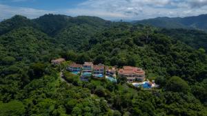 an aerial view of a resort in the mountains at Casa Garmus 10 bdrs ocean views in Los Suenos in Herradura