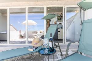 Posezení v ubytování Attico Gabriella vista mare - Salento Reservation