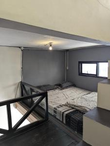 Ένα ή περισσότερα κρεβάτια σε δωμάτιο στο Pulang guest house