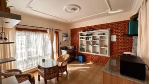 Khu vực ghế ngồi tại Raniban Suites - Apartment Home