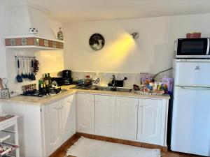 Kuchyň nebo kuchyňský kout v ubytování La casa del Capitano B&b + 4 fotografie