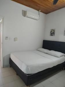 Postel nebo postele na pokoji v ubytování VILLA IRIS + 24 fotografií