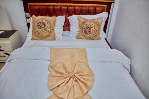 Ένα ή περισσότερα κρεβάτια σε δωμάτιο στο hotel samba