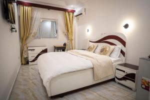 Ένα ή περισσότερα κρεβάτια σε δωμάτιο στο hotel samba