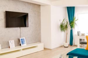 TV a/nebo společenská místnost v ubytování DREAMS ESCAPE 2