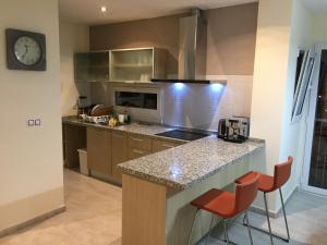 Kuchyň nebo kuchyňský kout v ubytování Résidence Saradon La Zenia Boulevard