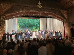 a group of people standing on a stage in front of a crowd at Appartement à la ferme vosgienne avec terrasse, cheminée et wifi - FR-1-589-759 in Fresse-sur-Moselle