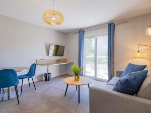 Posezení v ubytování Mercure Lyon Est Villefontaine