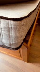 a close up of a bed with a mattress at Appartement studio TV avec Netflix - canal série - apple TV - OCS - Dazen - bein sport in Nancy