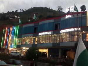 a large building with lights on the side of it at GC Hotel & Banquet Hall in Dargai