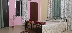 Ένα ή περισσότερα κρεβάτια σε δωμάτιο στο Peace Abode Vista