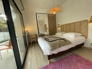 Katil atau katil-katil dalam bilik di Appartement de charme à Propriano, vue sur le Golfe