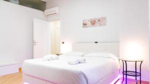 Giường trong phòng chung tại Miracle Boutique Apartment +38 ảnh