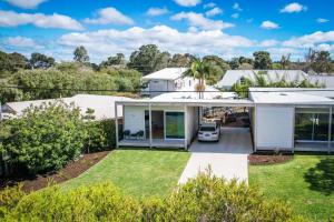an aerial view of a house with a yard at Ideally Located Modern Studio Apartment in Dunsborough