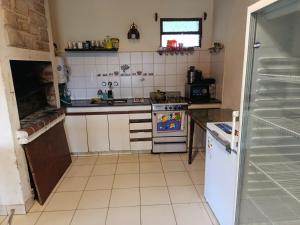 Η κουζίνα ή μικρή κουζίνα στο Apart hotel Las golondrinas