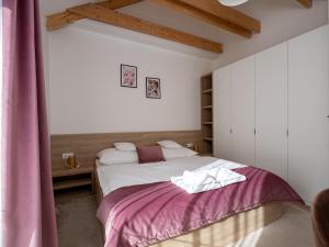 Postel nebo postele na pokoji v ubytování Apartments Severka - Jasná
