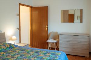 Una cama o camas en una habitación de Donatella&Thomas