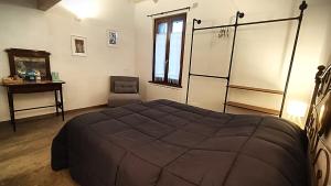 Postel nebo postele na pokoji v ubytování B&B Borgo Tre Case