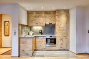 Η κουζίνα ή μικρή κουζίνα στο Apartment by Hotel Alpenstolz