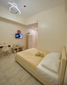 Postel nebo postele na pokoji v ubytování The VAs Nest Staycation