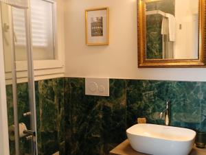 Un baño de Deco's Place Olivia 23 fotos más