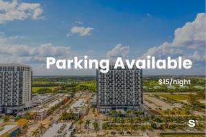 an image of a city with the words parking available at DTW Doral 2BD Condo Skyline Views in Miami