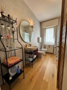 a bathroom with a sink and a mirror at Il Nido di Adele in Sernio