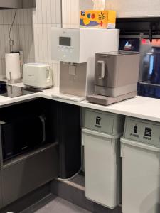 Η κουζίνα ή μικρή κουζίνα στο Hotel Myeongdon Station