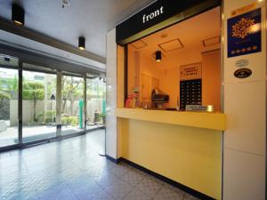 a front counter of a fast food restaurant at Hotel Cerezo in Tokyo