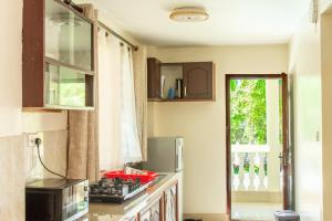Kuchyň nebo kuchyňský kout v ubytování Shimba Springs Bustani (Malindi)