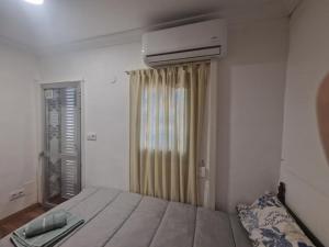 Ένα ή περισσότερα κρεβάτια σε δωμάτιο στο APARTAMENTO MADRID Norte