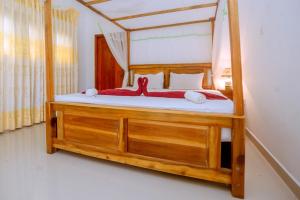 Postel nebo postele na pokoji v ubytování Rainforest River Edge Villa