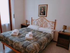 Postel nebo postele na pokoji v ubytování Cozy Apartment Cirillo5