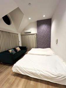 Postel nebo postele na pokoji v ubytování Green House Nakano Fujimicho - Vacation STAY 97900