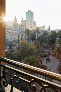 a view of a city from a balcony at Historic Loft Overlooking Plaza de Armas in Santiago
