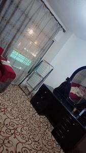 a room with a bed and luggage in a room at وسط البلد عمان in Amman