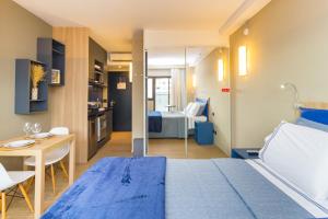 Postel nebo postele na pokoji v ubytování Flats Prime – Alpha Stay | Alphaville – Barueri – SP + 63 fotografií
