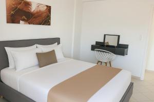 Postel nebo postele na pokoji v ubytování Villa Rania