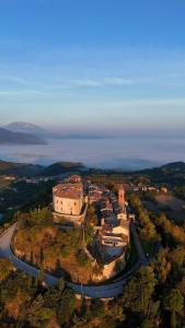 an aerial view of a house on an island at Casa vacanze Castello in Frontone