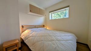 Postel nebo postele na pokoji v ubytování Résidence Jandri 2 by Leavetown Vacations