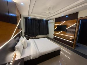 Postel nebo postele na pokoji v ubytování the best stay hotel in peshawar + 16 fotografií