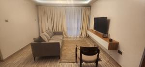 Μια τηλεόραση ή/και κέντρο ψυχαγωγίας στο The Beleza Suites +1 φωτογραφίες