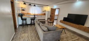 Μια τηλεόραση ή/και κέντρο ψυχαγωγίας στο The Beleza Suites