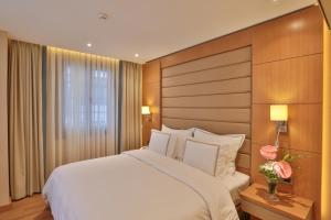 Letto o letti in una camera di Ada Suites Nisantasi