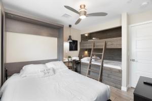 a bedroom with a bed and a bunk bed at Closest Walk to Old Town, Entertainment District in Scottsdale +51 photos
