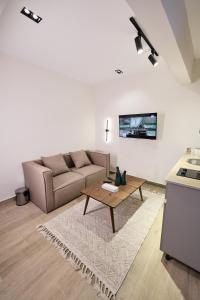 Χώρος καθιστικού στο Settle Inn Mirage Boutique Hotel